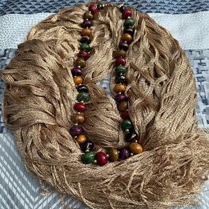 Shawl and beaded necklace